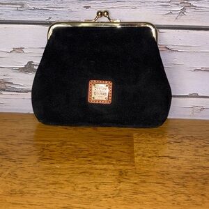 Dooney and bourke black suede large framed kiss lock pouch.